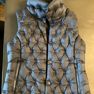 The North Face black XS puffer vest.